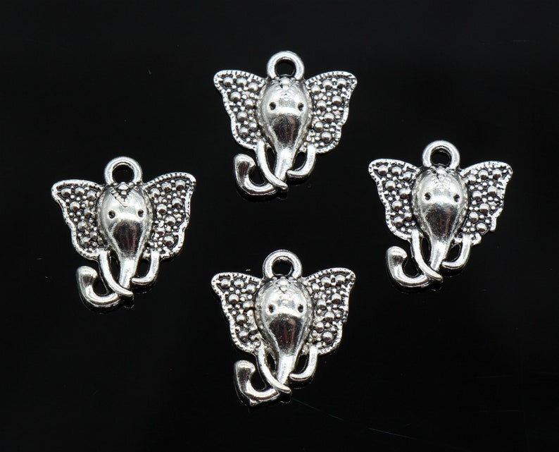 8pcs Antique Style Silver Tone Alloy Elephant Head Wild Pendant Charms 45mm 8pcs Antique Style Silver Tone Alloy Elephant Head Wild Pendant Charms 45mm