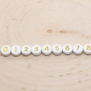 Contas redondas de ouro com números - Contas individuais brancas de 7 mm com números de ouro para fabricação de joias e artesanato