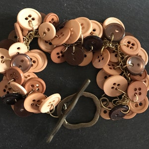 Earthen brown button charm bracelet with large toggle closure. Fall/ Autumn