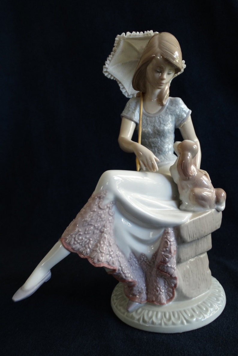 lladro lady with parasol and dog