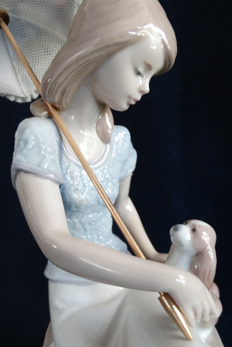 lladro lady with parasol and dog