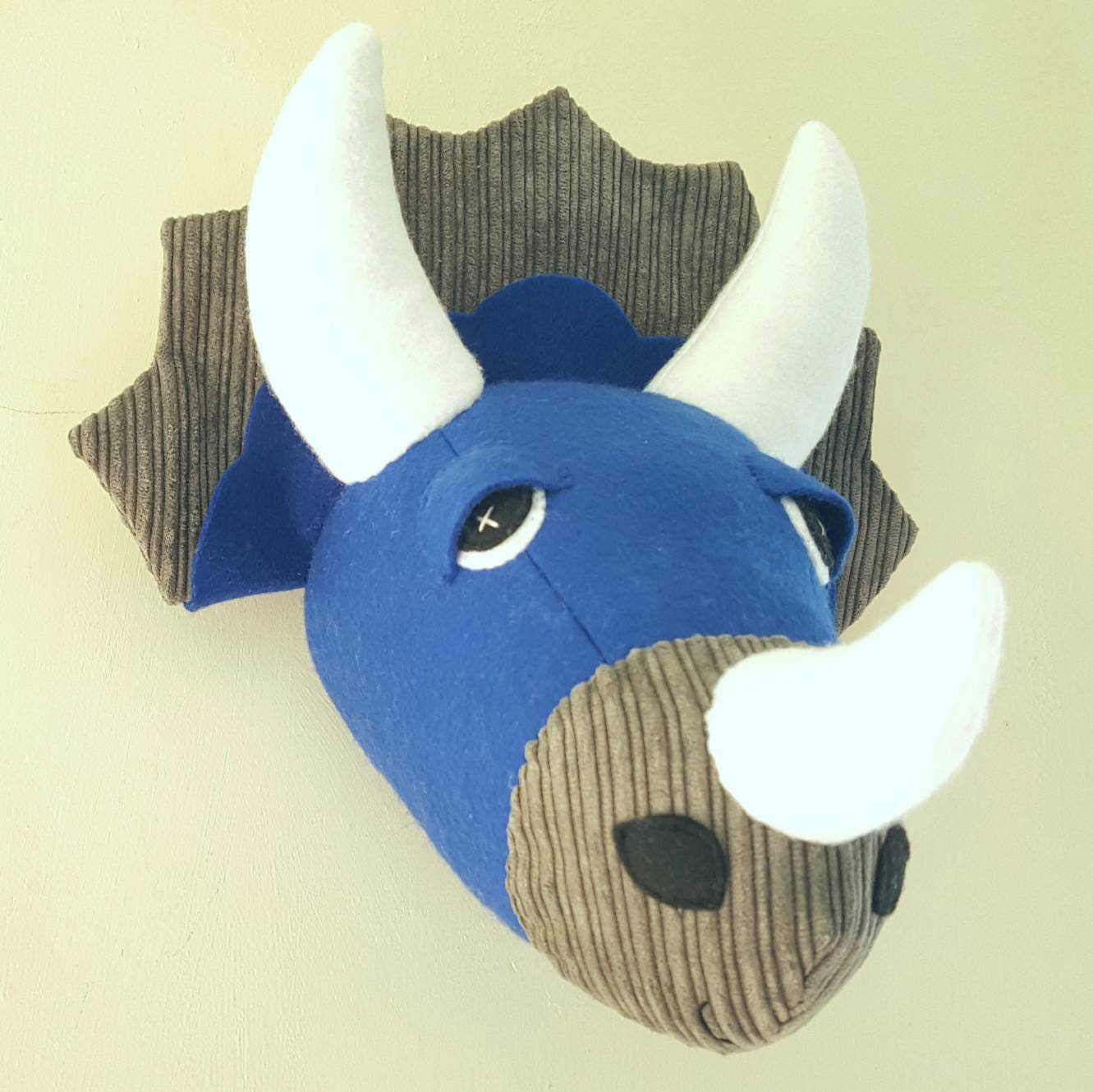 stuffed dinosaur head wall mount