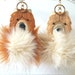 see more listings in the Faux fur pom poms section