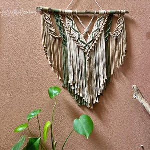 Macrame wall hanging featuring a raw clear quartz crystal