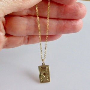 Collar vintage con dije de as de diamantes en oro de 9 quilates