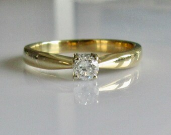 Anello solitario in oro 18 carati con diamante 0,25 carati