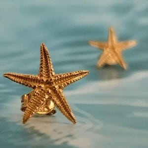 Gold plated starfish stud earrings