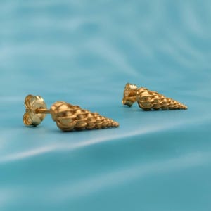 Gold plated conical seashell earrings