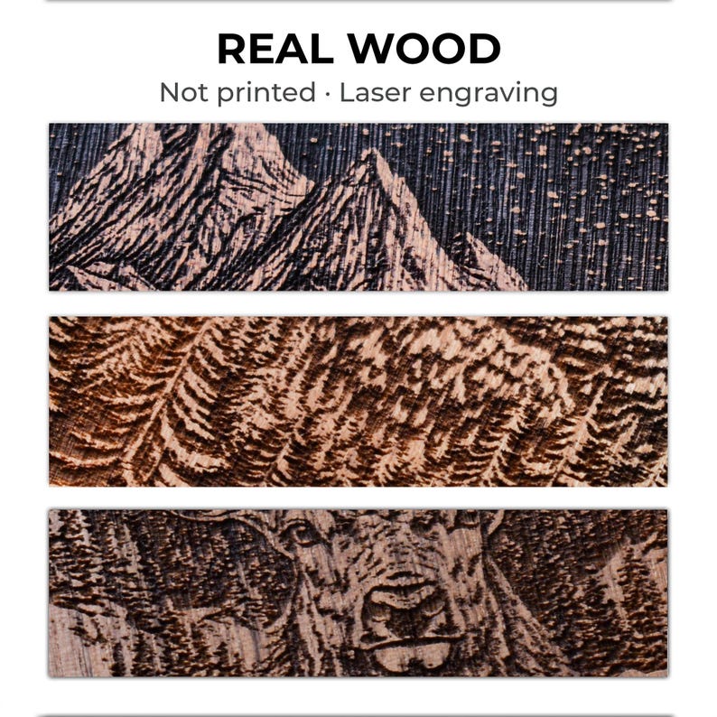 May include: Close-up of three wooden panels with laser-engraved designs. The top panel features a mountain range, the middle panel has a feather-like pattern, and the bottom panel depicts a deer. The text "REAL WOOD" and "Not printed. Laser engraving" are at the top.