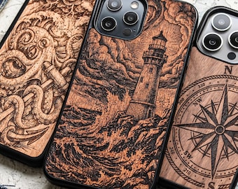 May include: Three smartphone cases with wood-grain back panels featuring laser-engraved designs. The left case shows an octopus and anchor, the center case depicts a lighthouse with stormy waves, and the right case displays a nautical compass.