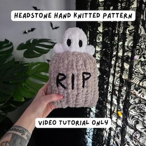 May include: A hand-knitted headstone plushie made of soft, textured beige yarn with a white ghost figure on top. The front features the black embroidered text RIP. The image includes the text HEADSTONE HAND KNITTED PATTERN and VIDEO TUTORIAL ONLY.