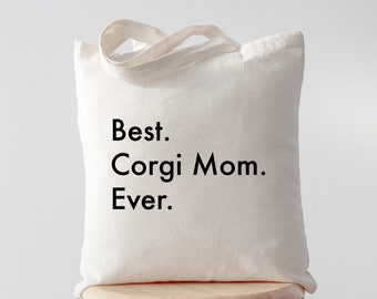 May include: White canvas tote bag with black text that reads "Best. Corgi Mom. Ever."