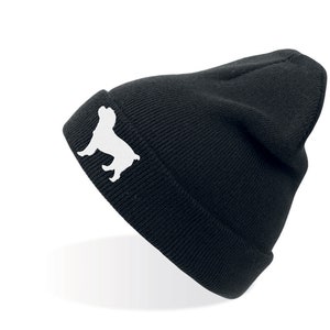 Puede incluir: Gorro negro con una silueta blanca de un bulldog francés en el lateral.