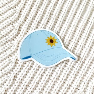 Chapeau de baseball bleu clair avec autocollant de patch de tournesol, 2.5x2in. image 1