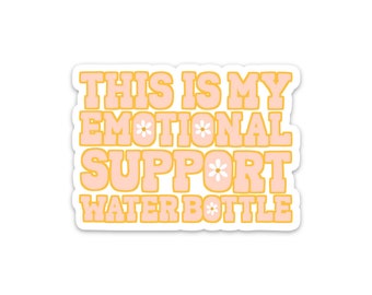 May include: A sticker with the text "This is my emotional support water bottle" in pink and yellow letters with white daisy flowers.