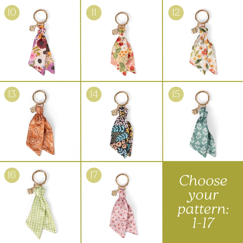 May include: A collection of keychains with decorative fabric tassels in various floral and patterned designs. Each keychain features a gold-colored ring and charm. The image includes the text "Choose your pattern: 1-17".