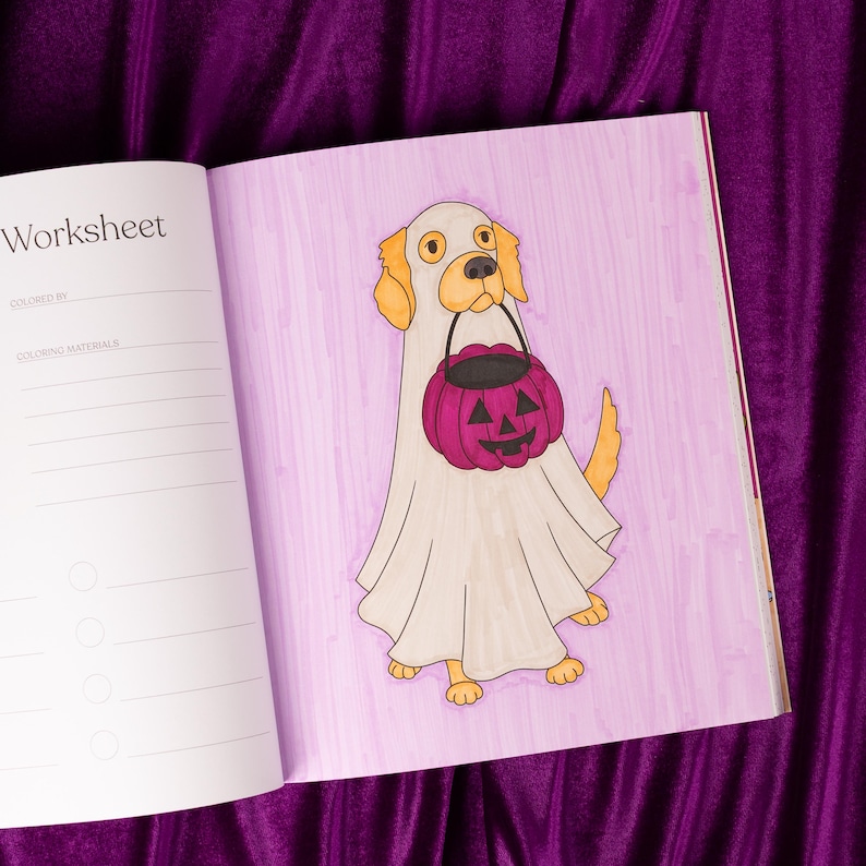 May include: A coloring book page featuring a cartoon dog dressed as a ghost, holding a purple jack-o'-lantern bucket. The dog has tan ears and paws. The page is labeled "Worksheet" and is on a purple background.
