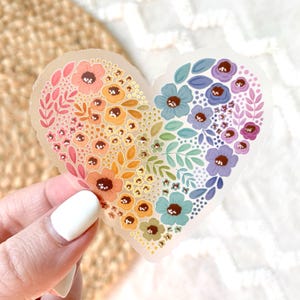 Clear Pride Regenbogenherz Aufkleber, 7 x 3 cm.