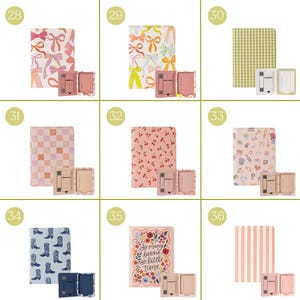 May include: A collection of notebooks and matching phone stands. The notebooks feature various patterns, including bows, cherries, gingham, and cowboy boots. One notebook has the text "So many books so little time."