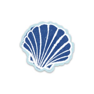 May include: A blue and white seashell sticker with a light blue border. The seashell design features white vertical lines against a blue background, creating a textured appearance. The sticker is round and has a scalloped edge.