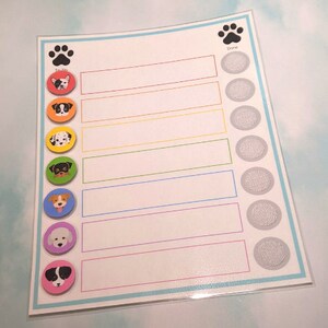 May include: A white dry-erase board with a colorful chart for tracking tasks. The chart has seven rows with a paw print icon and a dog illustration in each row. The words "To Do" and "Done" are printed at the top of the chart.