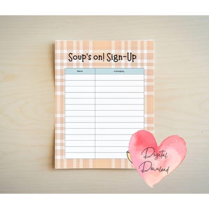 May include: A sign-up sheet with the text "Soup's on! Sign-Up" in a plaid pattern. The sheet has spaces for names and what they are bringing. A pink heart with the words "Digital Download" is in the lower right corner.