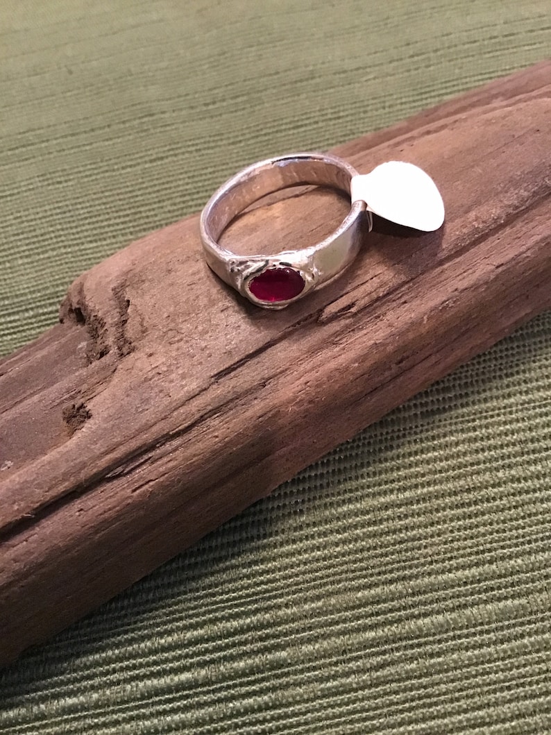 Synthetic ruby stone and sterling silver ring