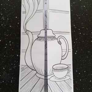 May include: A black and white line drawing of a teapot and a teacup on a wooden surface. The teapot has a spout and a handle. The teacup has a handle and a saucer. The drawing is on a white background.
