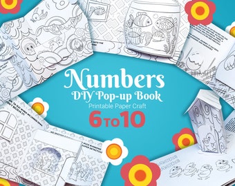 May include: A printable paper craft pop-up book for kids to color and assemble. The book features numbers 6 to 10 and includes various pop-up designs, such as a birdhouse, a fish tank, and a duck family. The book is designed for children to learn about numbers and have fun with crafts.