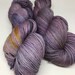 Hand dyed yarn fall/Halloween, Hand Dyed Worsted weight  yarn Hocus Pocus in purples blacks, and gold.