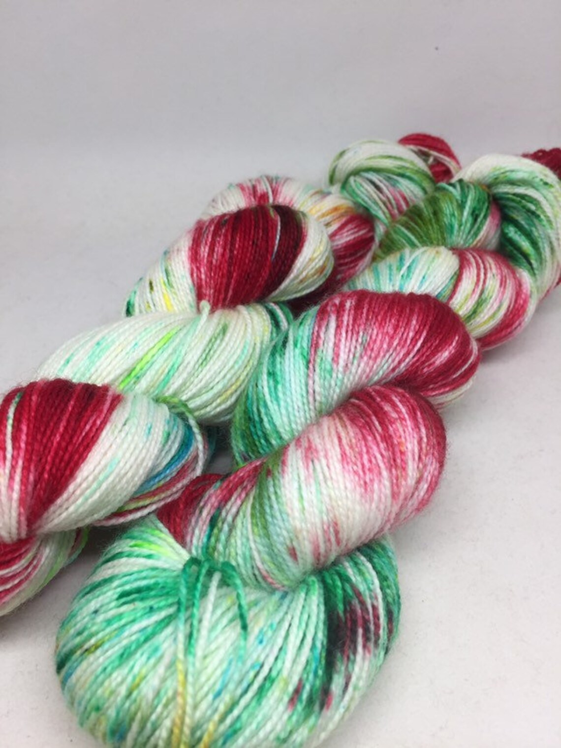 Christmas sock yarn variegated in red gold and blue and green Etsy