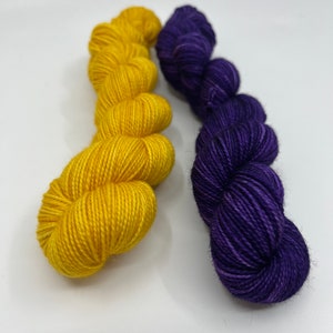 Pigskin Exclusive this team color listing is for participants of Pigskin only, 50 gram skeins of gold and purple yarn, hand dyed yarn