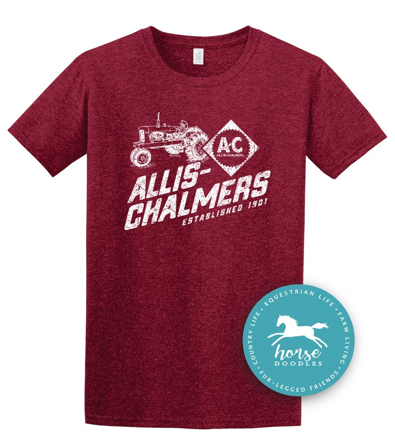 May include: Maroon t-shirt with a white graphic of a tractor and the text "ALLIS-CHALMERS ESTABLISHED 1901". A circular sticker with a horse graphic and the words "horse doodles" is on the bottom right.