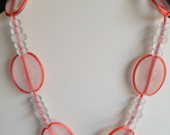 White and orange whimsical necklace