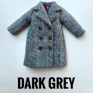 May include: A dark gray tweed coat with a double breasted closure and four gold buttons. The coat has a collar and long sleeves.