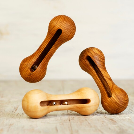 wooden rattle with bells