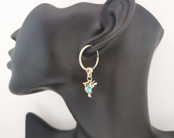 Elegant Hummingbird Earrings in Gold with a Vibrant Blue Stone, Available in Hoops or Long and Dangling. Comes with a  Pretty Velvet Pouch.