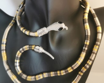 Adjustable, multi-functional egypitan style snake necklace with gold and silver stripes, gold and pewter  perfect for any occoasion.