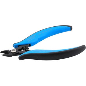 May include: Blue and black wire cutters with a spring and pivot point. The handles are blue with black rubber grips. The cutting blades are black and angled.