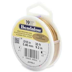 May include: A spool of 19-strand gold-colored bead stringing wire. The spool is labeled "Beadalon" and has the measurements 0.018 in (0.46 mm) and 30 ft (9.2 m).