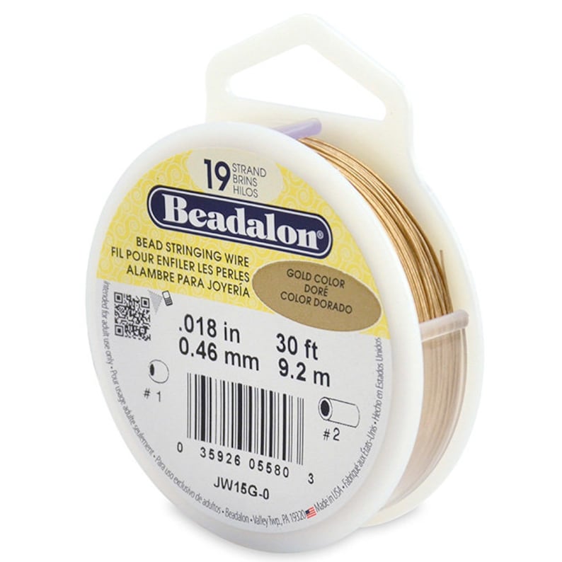 May include: A spool of 19-strand gold-colored bead stringing wire. The spool is labeled "Beadalon" and has the measurements 0.018 in (0.46 mm) and 30 ft (9.2 m).