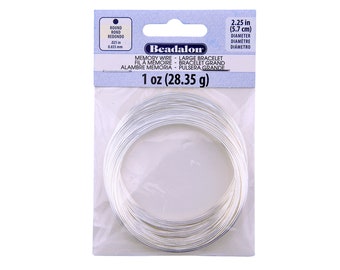 May include: A spool of silver memory wire, 1 ounce (28.35 grams), with a 2.25 inch (5.7 cm) diameter. The wire is designed for making large bracelets.