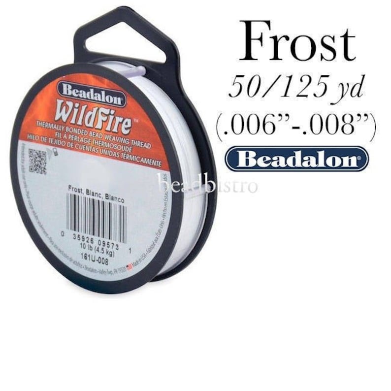 May include: A spool of white Beadalon WildFire thermally bonded bead weaving thread. The spool is labeled with the text "Beadalon WildFire" and "Thermally Bonded Bead Weaving Thread". The spool is 50/125 yards and .006" - .008" in diameter.