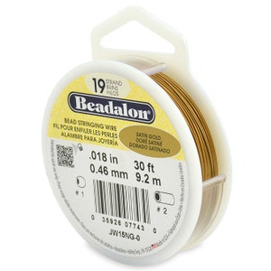 May include: A spool of 19 strand satin gold beading wire, 0.018 inches in diameter, 30 feet long. The spool is labeled "Beadalon" and has a barcode and product information.