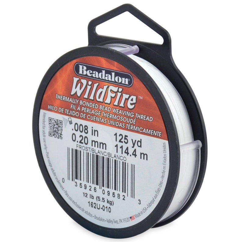 May include: White Beadalon WildFire thermally bonded bead weaving thread spool. 0.008 in (0.20 mm), 125 yd (114.4 m), 12 lb (5.5 kg). Frost/Blanc/Blanco. 162U-010.