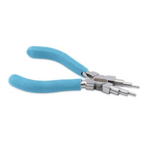 May include: A pair of silver-colored pliers with light blue cushioned handles. The pliers have multiple rounded tips of varying sizes. The word "Pakistan" is printed on the pliers.