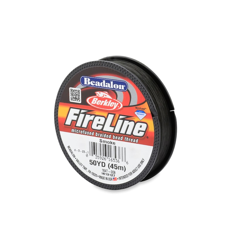 May include: A spool of black Beadalon FireLine microfused braided bead thread. The label is red and black with the text "Beadalon FireLine microfused braided bead thread" and "Smoke". The spool is 50 yards (45 meters).