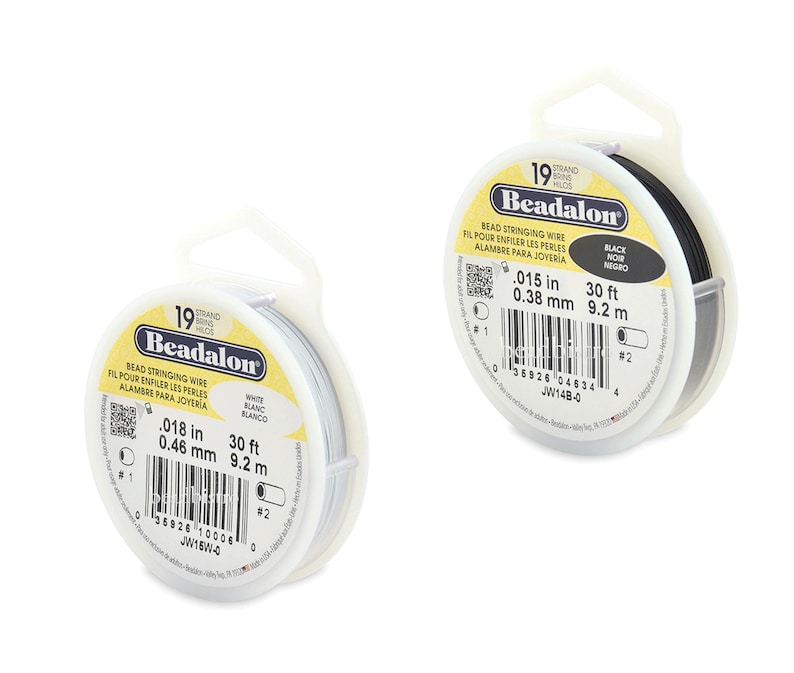 May include: Two spools of Beadalon bead stringing wire. One spool is white and the other is black. Both spools are 30 feet long and have a 19 strand count. The white spool is 0.018 inches or 0.46 millimeters in diameter. The black spool is 0.015 inches or 0.38 millimeters in diameter.