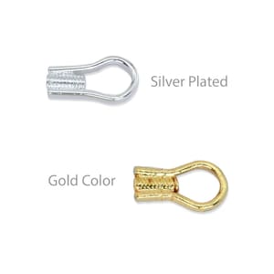 May include: Two metal crimp end findings, one silver-plated and one gold-colored. Each has a ribbed section for securing to a cord or ribbon, and a loop for attaching to a clasp or other findings. The text in the image says "Silver Plated" and "Gold Color".