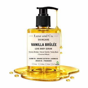 May include: A clear glass bottle of Luxe and Co. Vanilla Br&ucirc;l&eacute;e Luxe Body Serum with a black pump dispenser. The label lists ingredients like Creme Br&ucirc;l&eacute;e, Velvet Vanilla, and Caramel Musk. The serum is a golden color, with a few drops visible.